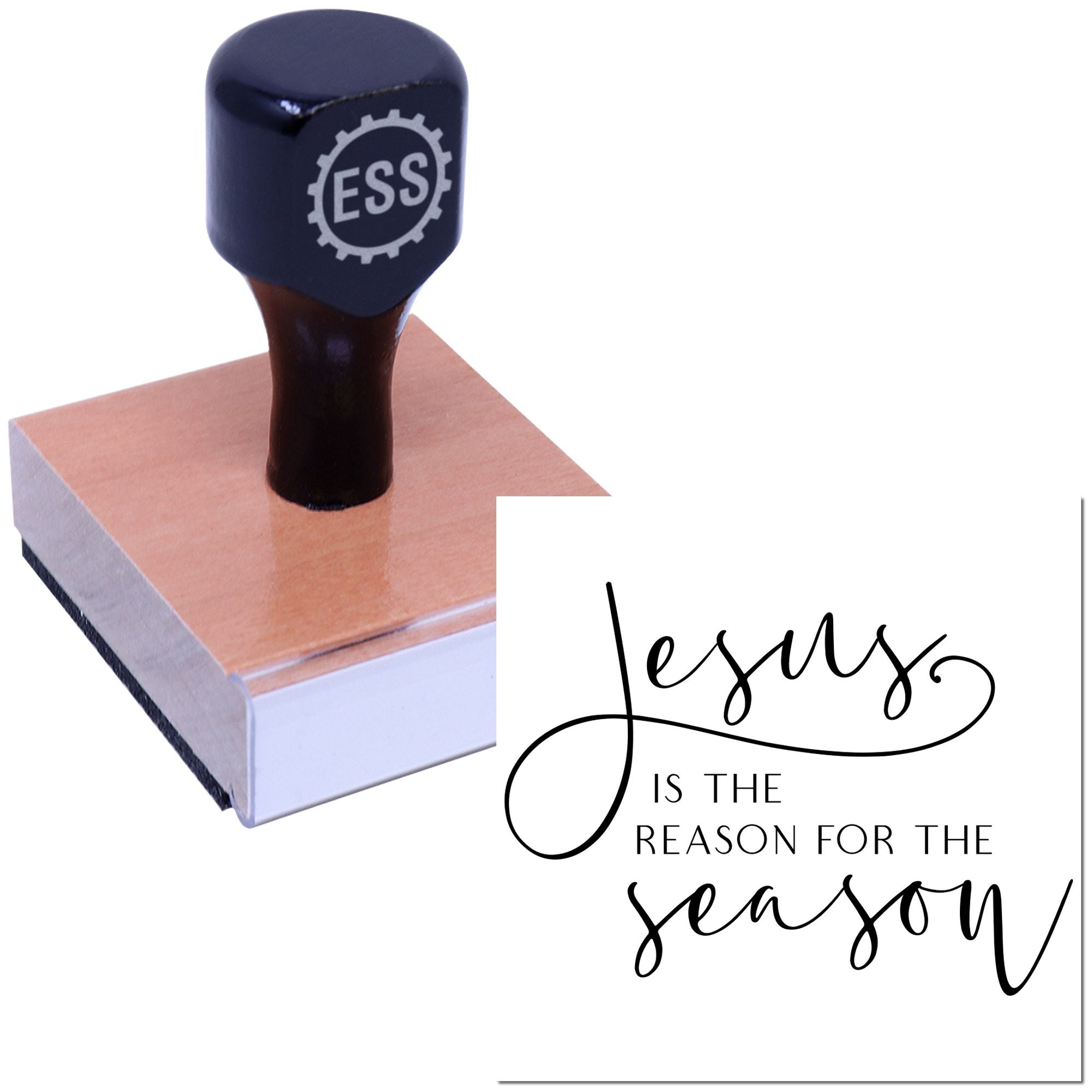 Black ESS rubber stamp and seal on a wooden block, with a white card reading Jesus is the reason for the season.