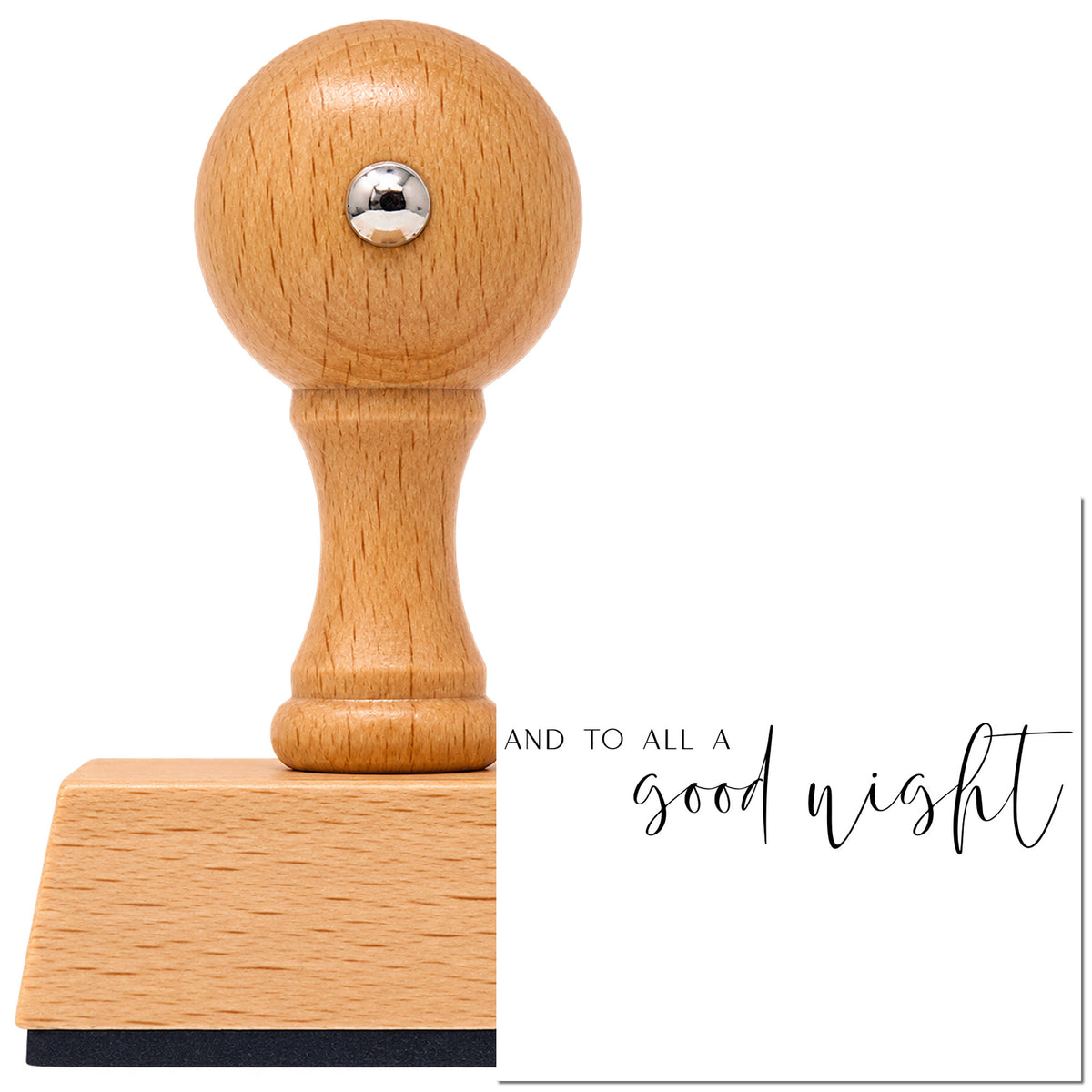 Vintage Pro beech wood stamp with a round knob handle, shown with its black And To All Good Night imprint on white.