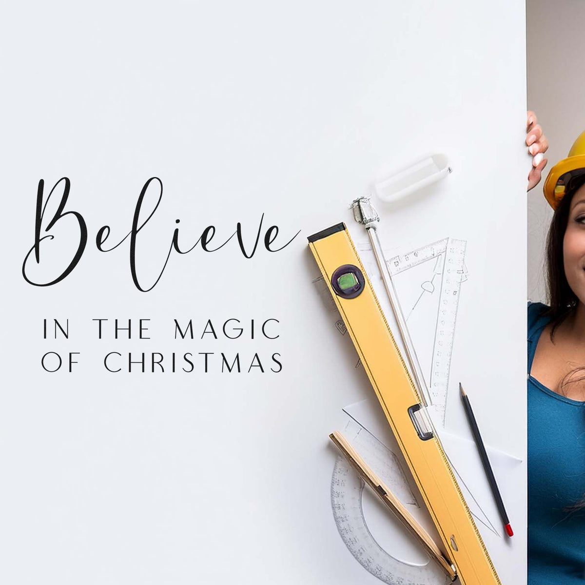 White Christmas poster with black script, yellow stamp and seal tools, ruler, pencil, and woman in hard hat.