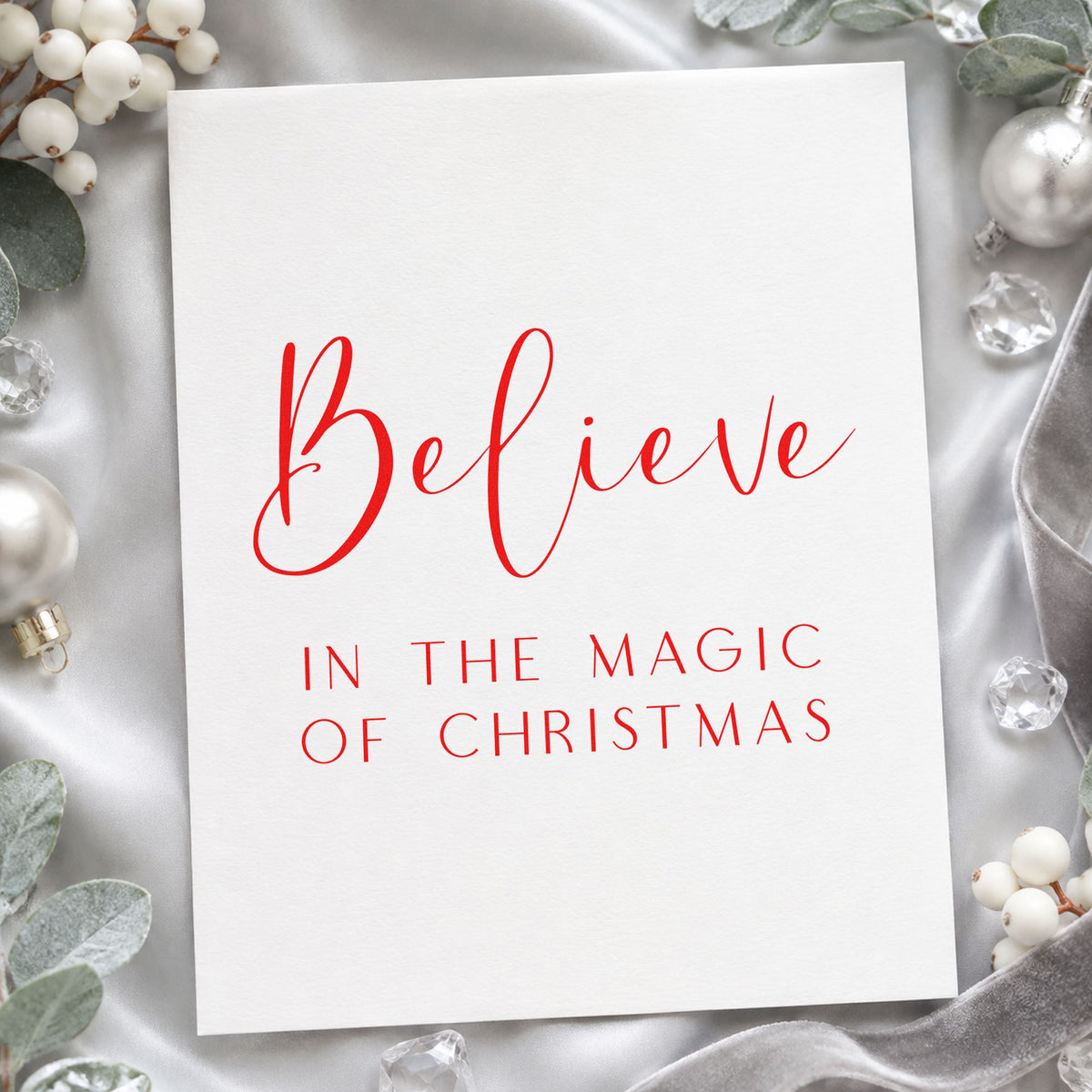 Believe In Magic Of Christmas rubber stamp shown in red ink, stamped for projects such as bottle sleeve labels.