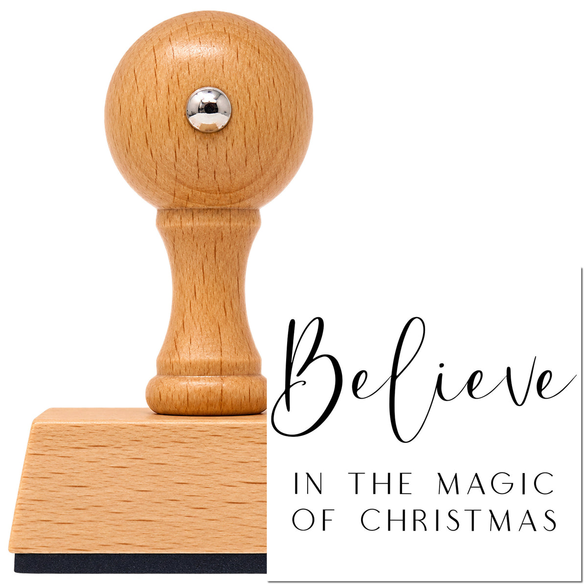 Vintage Pro beech wood stamp with a round knob handle, shown with its black Believe In The Magic Of Christmas Script Lettering imprint on white.