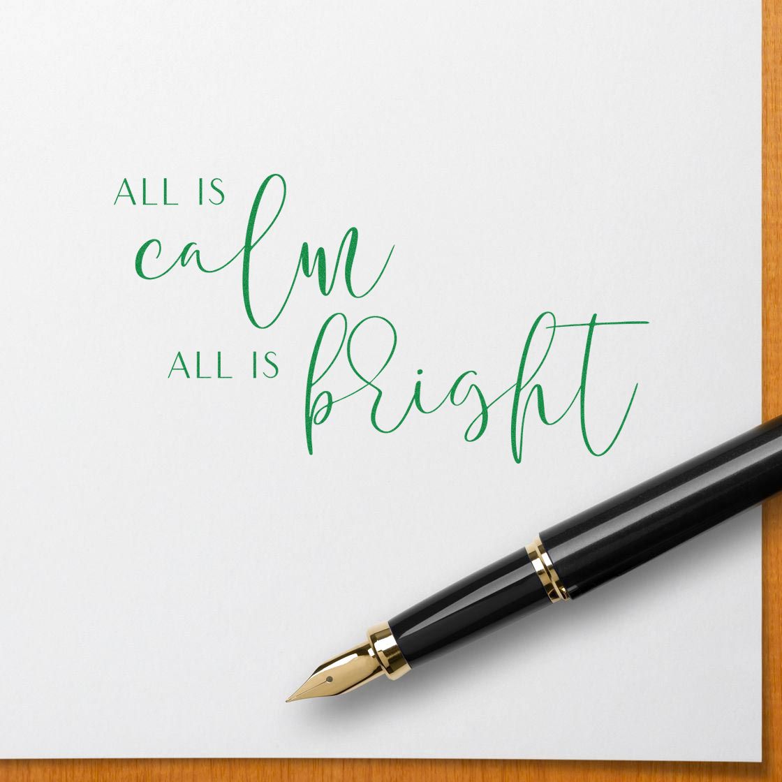 Green calligraphy All is calm, all is bright on white paper with black-and-gold fountain pen, stamp and seal product design.