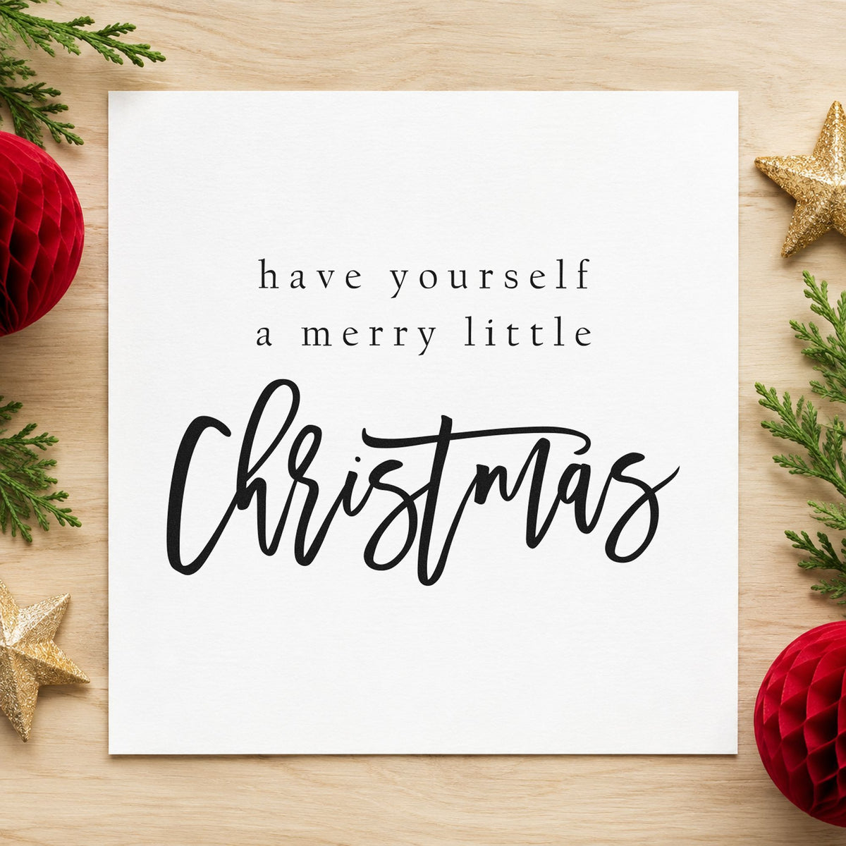 Have Yourself Merry Little Christmas craft stamp imprint in black ink on a handmade project, one idea being single word tags.