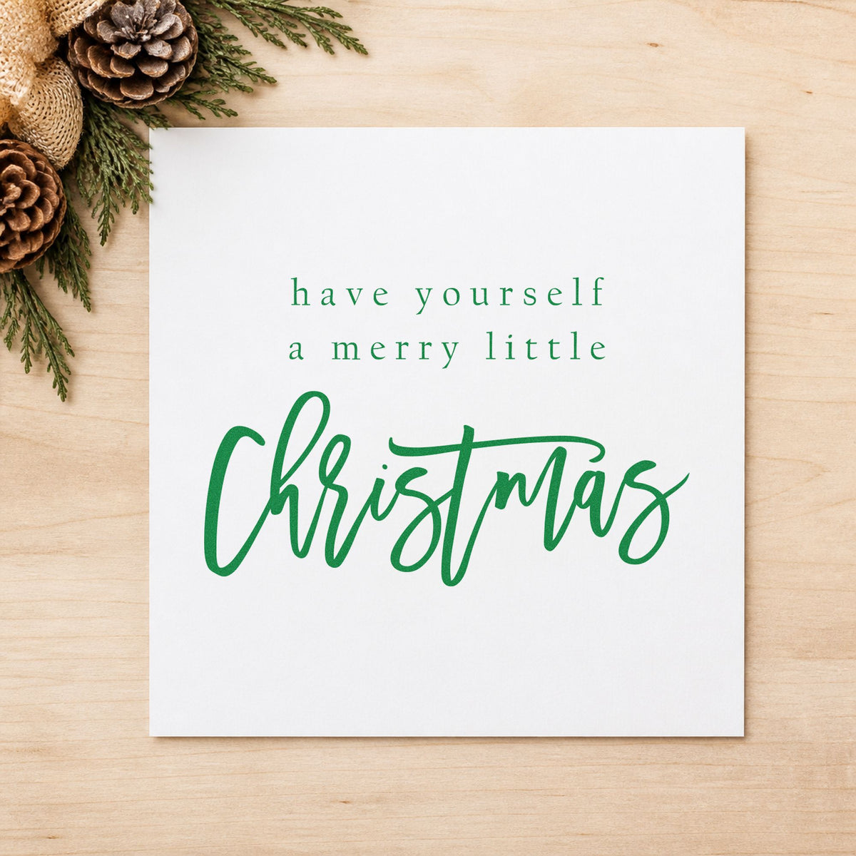 Have Yourself Merry Little Christmas craft stamp imprint in green ink on a handmade project, one idea being class sheet cards.