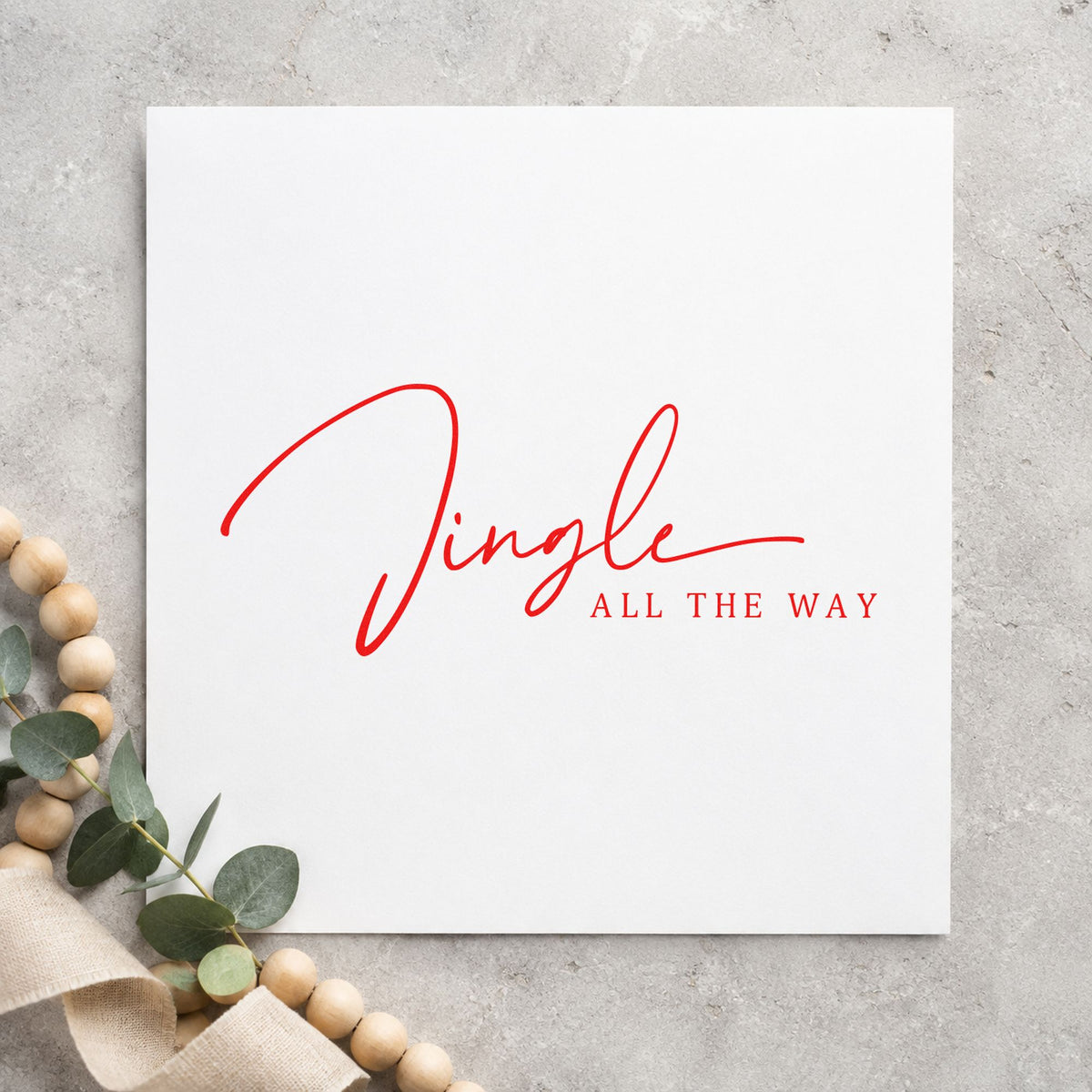 Jingle All The Way Fine craft stamp in red ink on cardstock, an easy option for organza band printing.