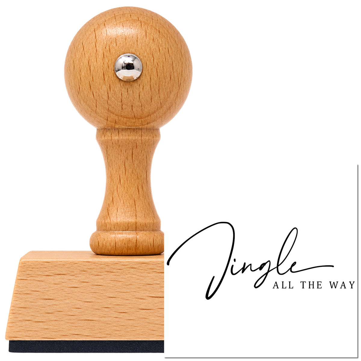 Vintage Pro beech wood stamp with a round knob handle, shown with its black Jingle All The Way Fine Script Lettering imprint on white.