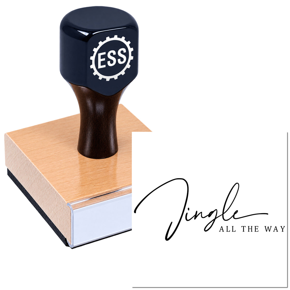 Black ESS stamp and seal tool on copper block, with "Jingle all the Way" script on white background.
