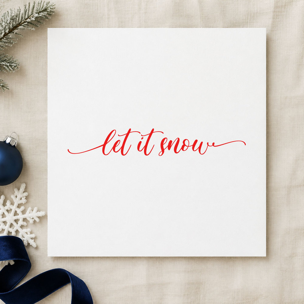 Let It Snow Flourished Line craft stamp in red ink on cardstock, an easy option for ribbon run printing.