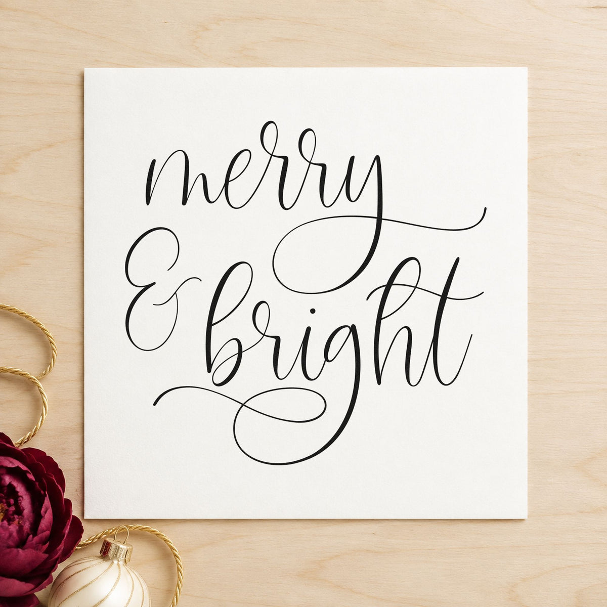 Merry And Bright Looped Script rubber stamp printed in black ink, ready for guide line sheet and similar paper crafts.