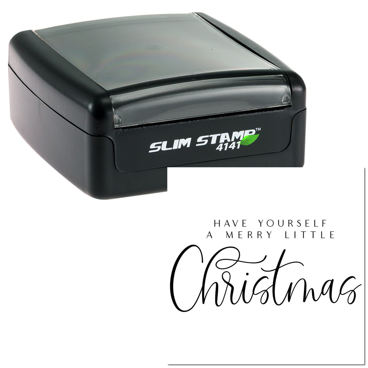 Black slim self-inking stamp with clear top, printing a Merry Christmas script seal on a white card.