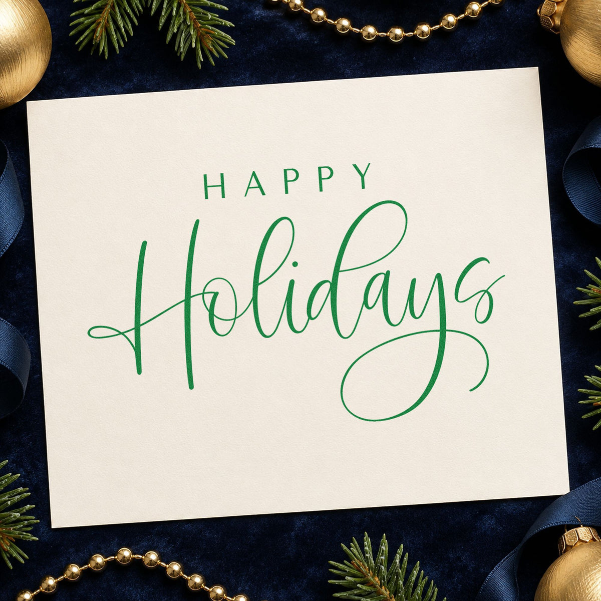 Happy Holidays Thin Calligraphy craft stamp imprint in green ink on a handmade project, one idea being quote sheet cards.