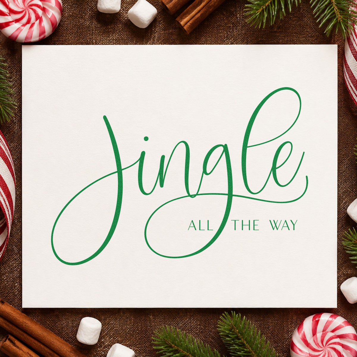 Jingle All The Way Calligraphy craft stamp imprinted in green ink on paper, a design suited to framed wide mat.