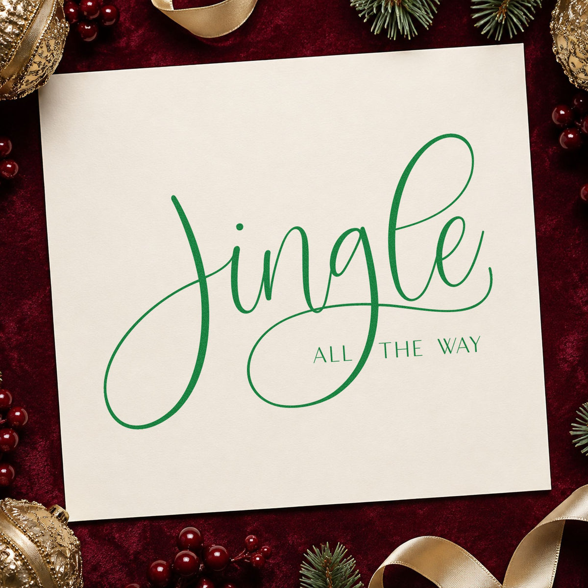 Jingle All The Way Calligraphy craft stamp imprint in green ink on a handmade project, one idea being formal slip cards.