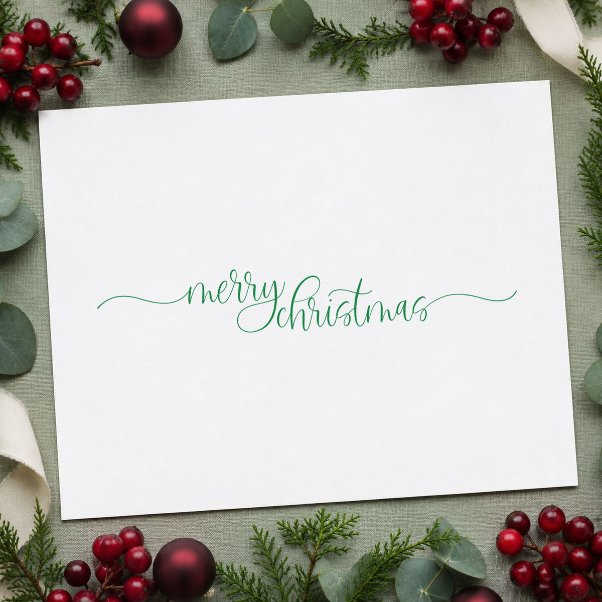 Merry Christmas Fine Flourishes craft stamp imprinted in purple ink on paper, a design suited to framed transom panel.