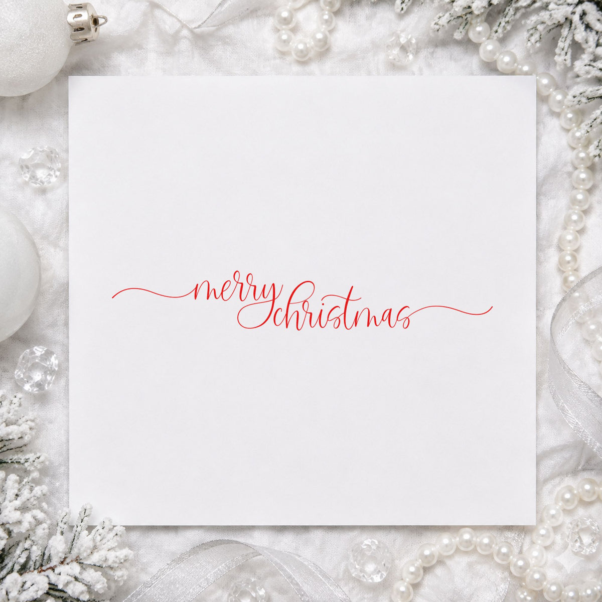 Merry Christmas Fine Flourishes rubber stamp shown in purple ink, stamped for projects such as shelf front labels.