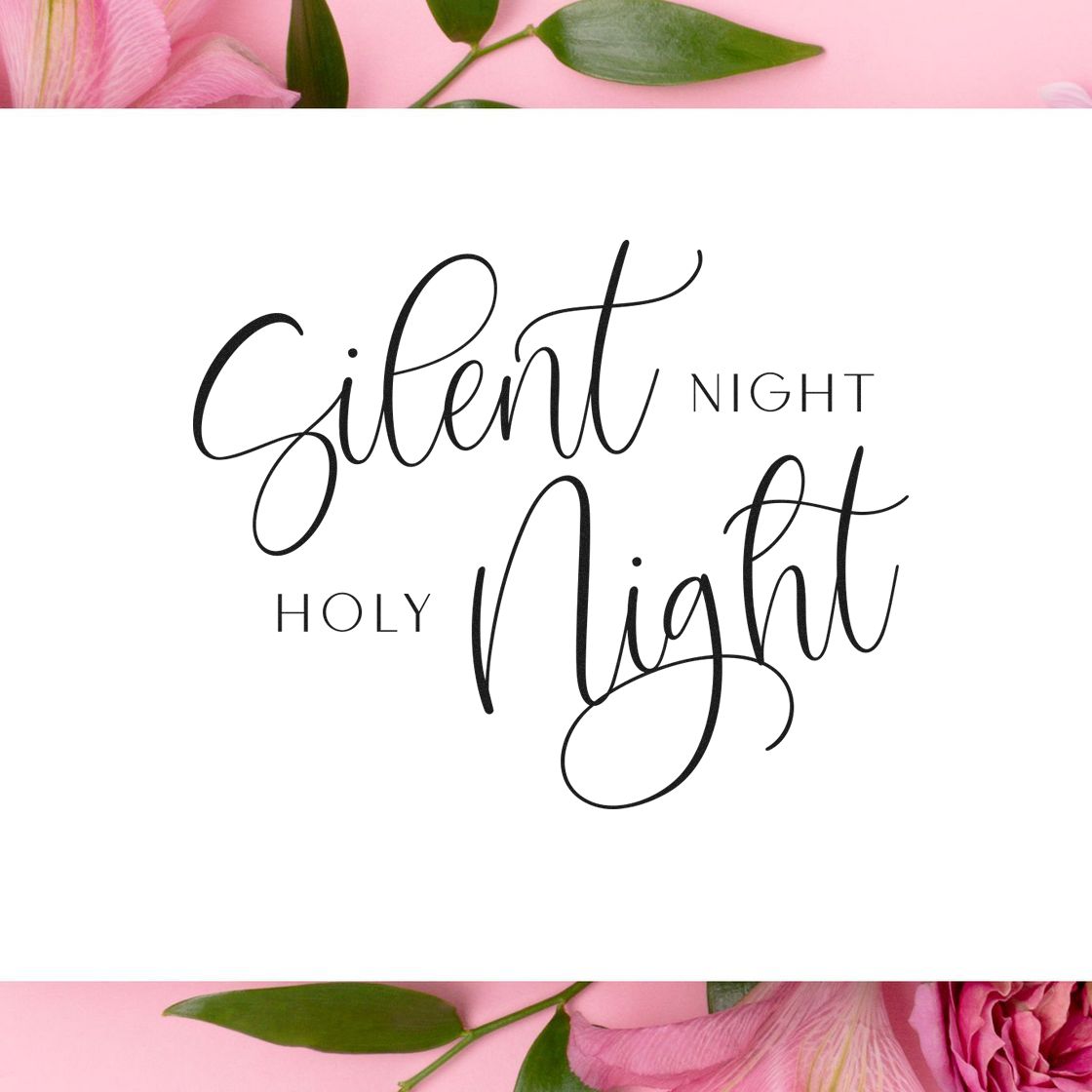 Silent Night Holy Night black script stamp and seal on white, framed by pink flowers and green leaves