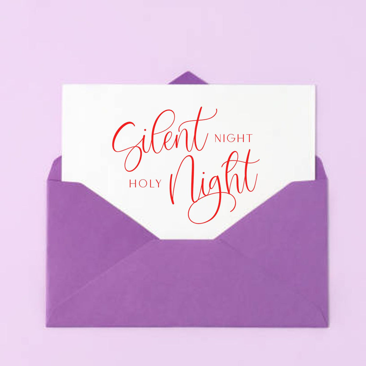 Purple stamp and seal product with white card, red Silent Night Holy Night script, tucked in a purple envelope.