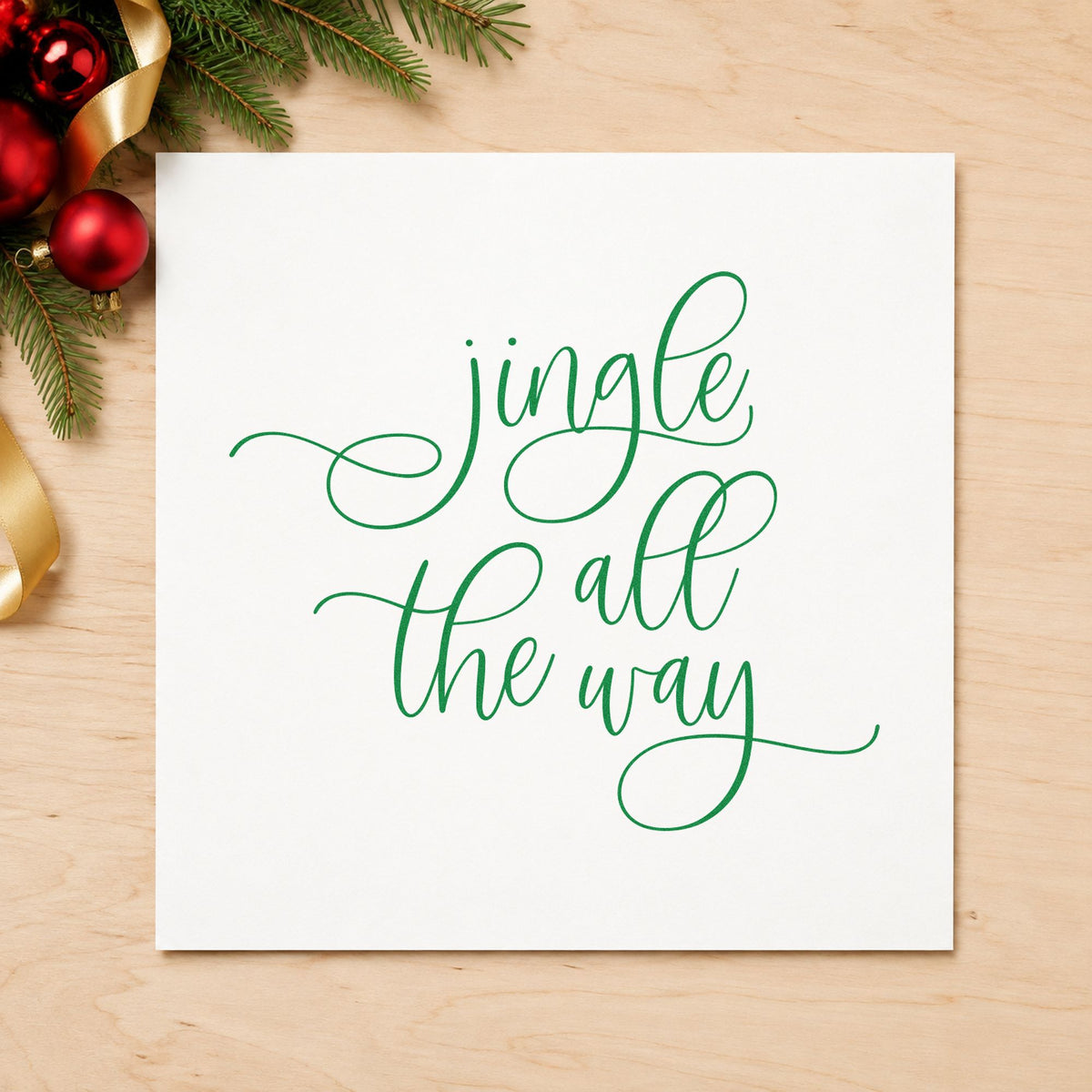 Jingle All The Way Loops craft stamp imprinted in green ink on paper, a design suited to framed narrow tall.