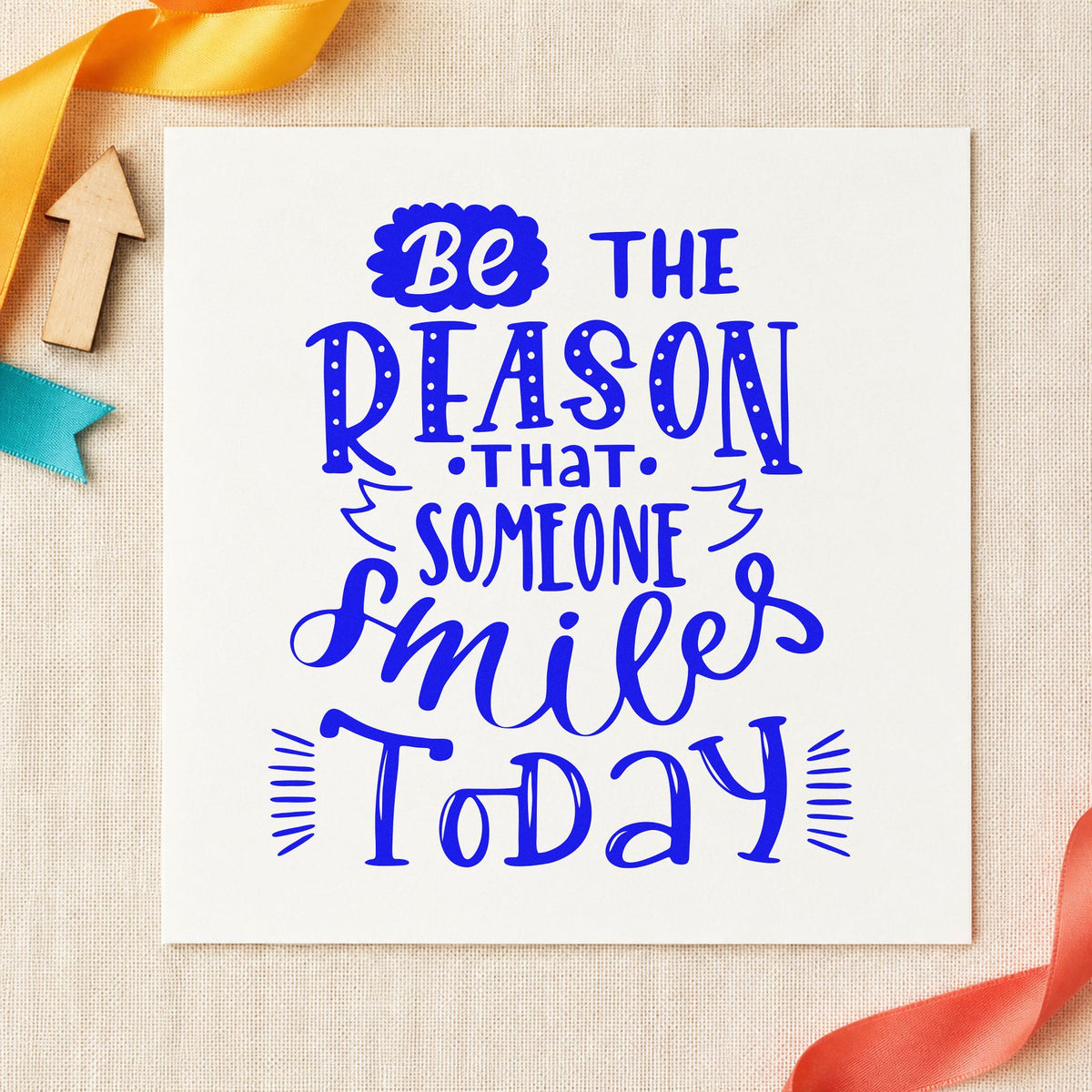 Be Someone's Reason To Smile craft stamp in blue ink on cardstock, an easy option for tote face printing.
