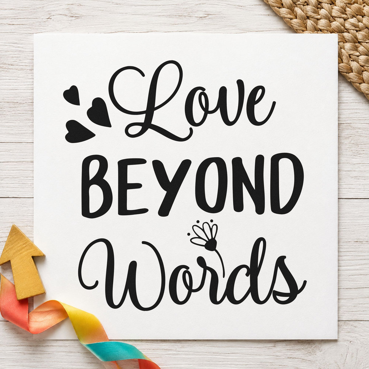 Love Beyond Words Hearts craft stamp imprint in black ink on a handmade project, one idea being bouquet gift tags.
