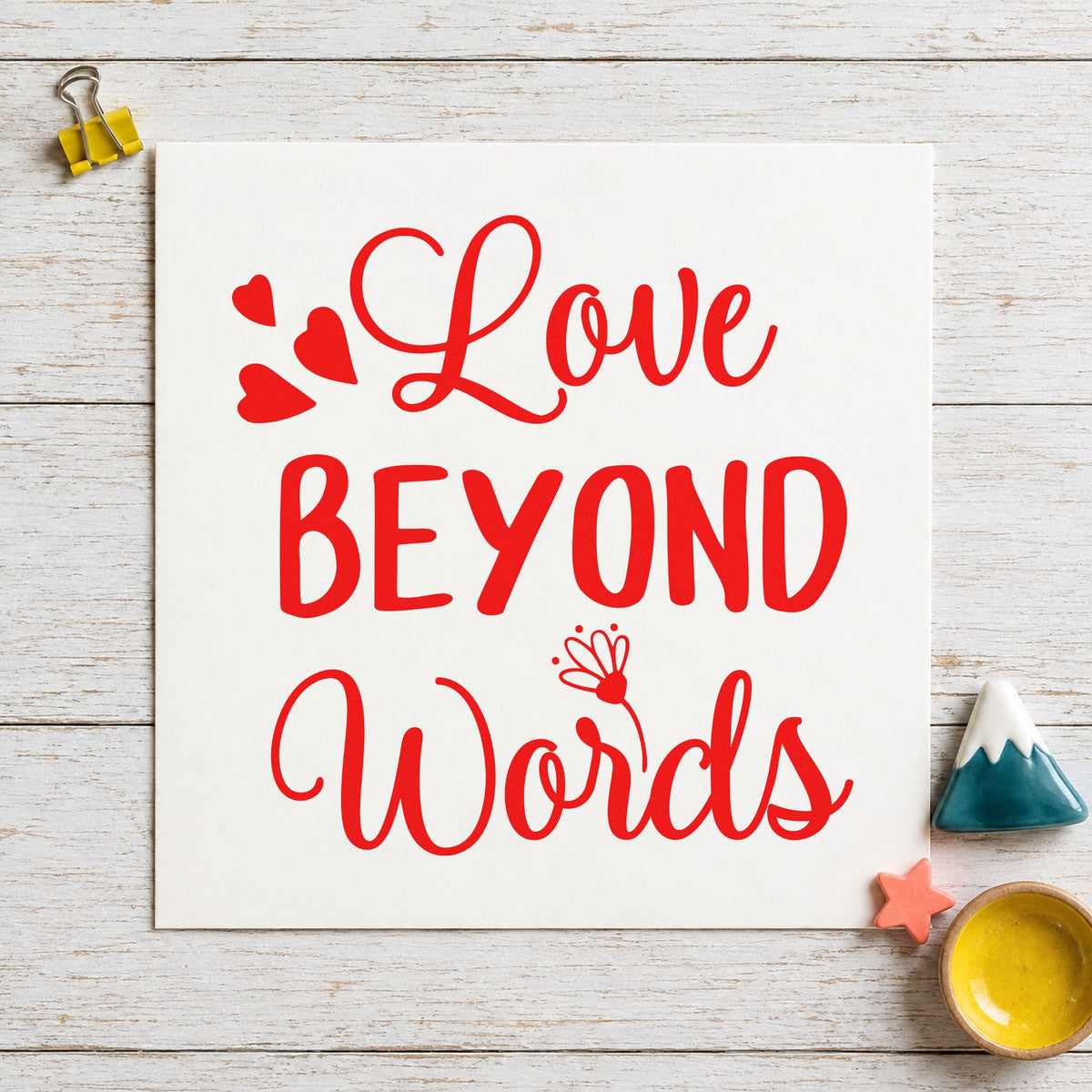 Love Beyond Words Hearts craft stamp imprint in red ink on a handmade project, one idea being vow renewal cards.