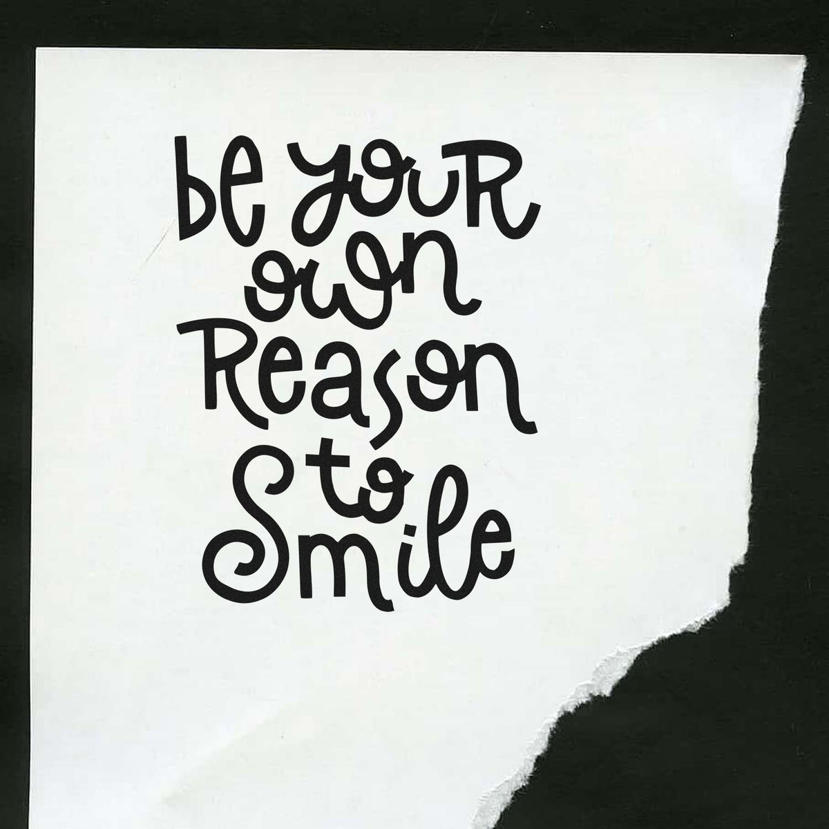 Black custom stamp reading be your own reason to smile on white paper with torn edge, seal and stamping product.