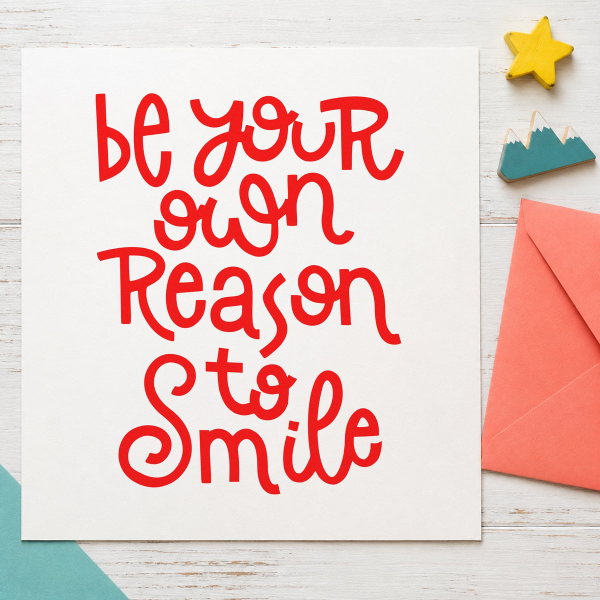 Be Your Own Reason Smile craft stamp imprint in red ink on a handmade project, one idea being mirror note cards.