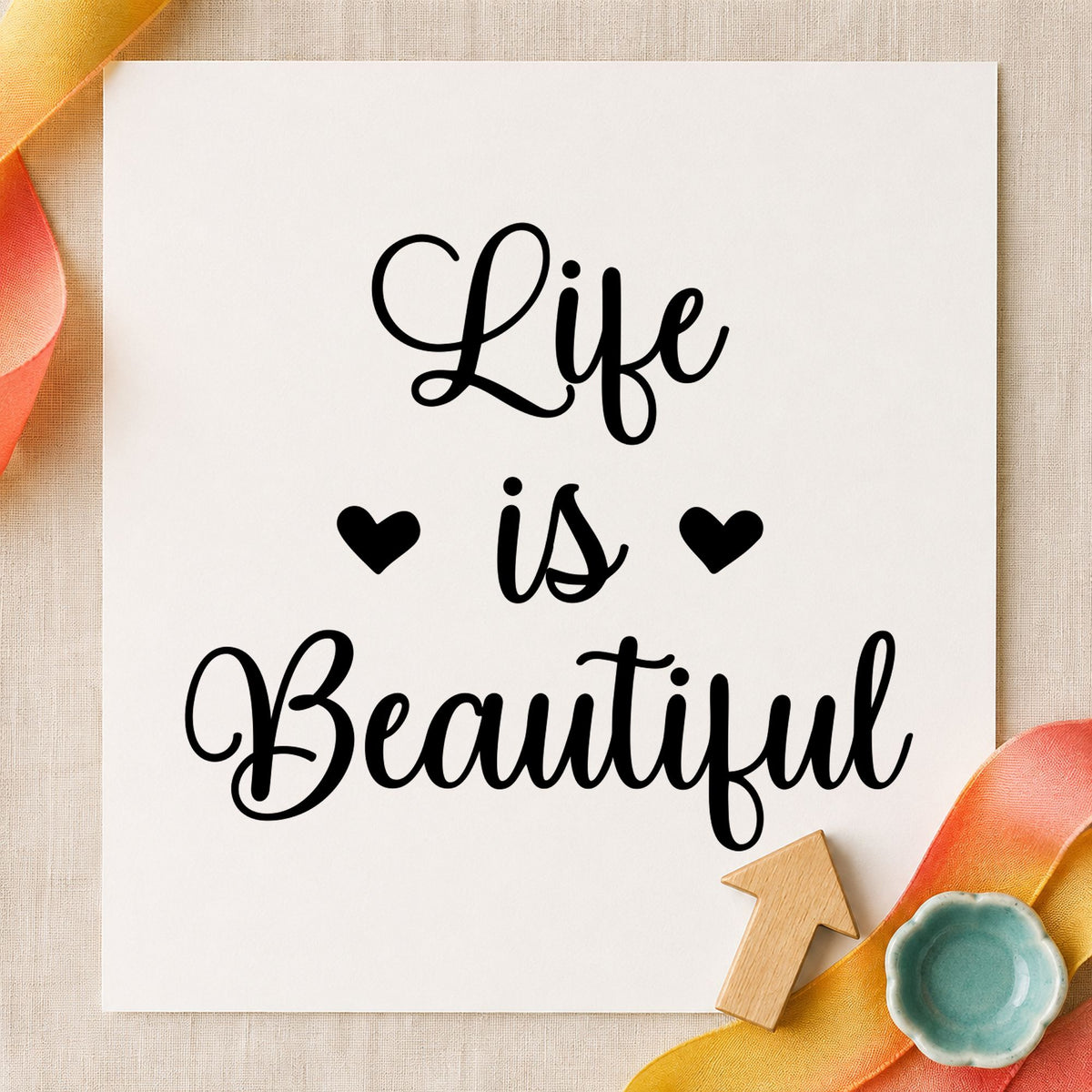 Life Is Beautiful Hearts craft stamp imprint in black ink on a handmade project, one idea being print sleeve gift tags.