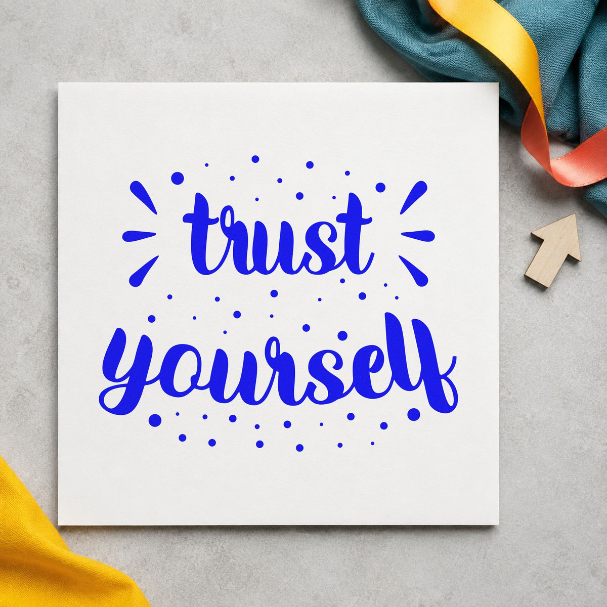 Trust Yourself Dotted Lettering craft stamp imprinted in blue ink on paper, a design suited to framed dressing room.