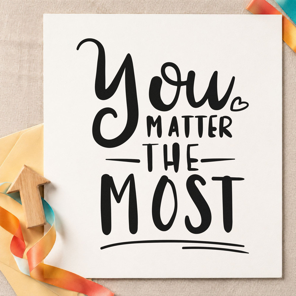 You Matter The Most craft stamp imprint in black ink on a handmade project, one idea being meal drop gift tags.