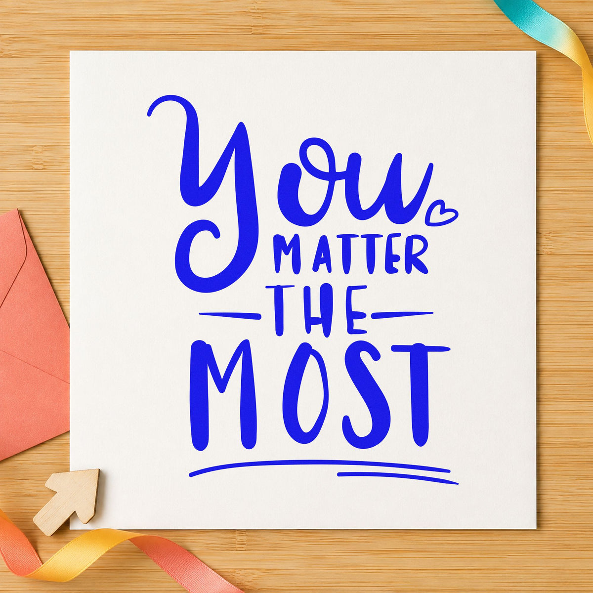 You Matter The Most craft stamp in blue ink on cardstock, an easy option for lap quilt printing.