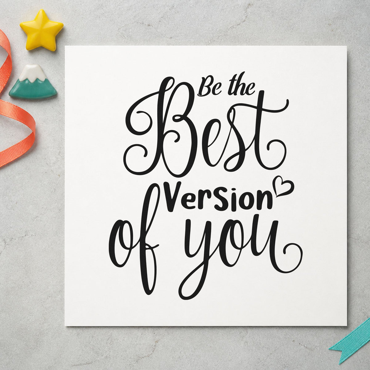 Best Version Of You craft stamp imprint in black ink on a handmade project, one idea being planner set gift tags.