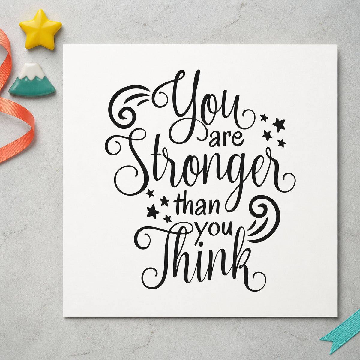 Stronger Than You Think rubber stamp printed in black ink, ready for weekly mile sheet and similar paper crafts.