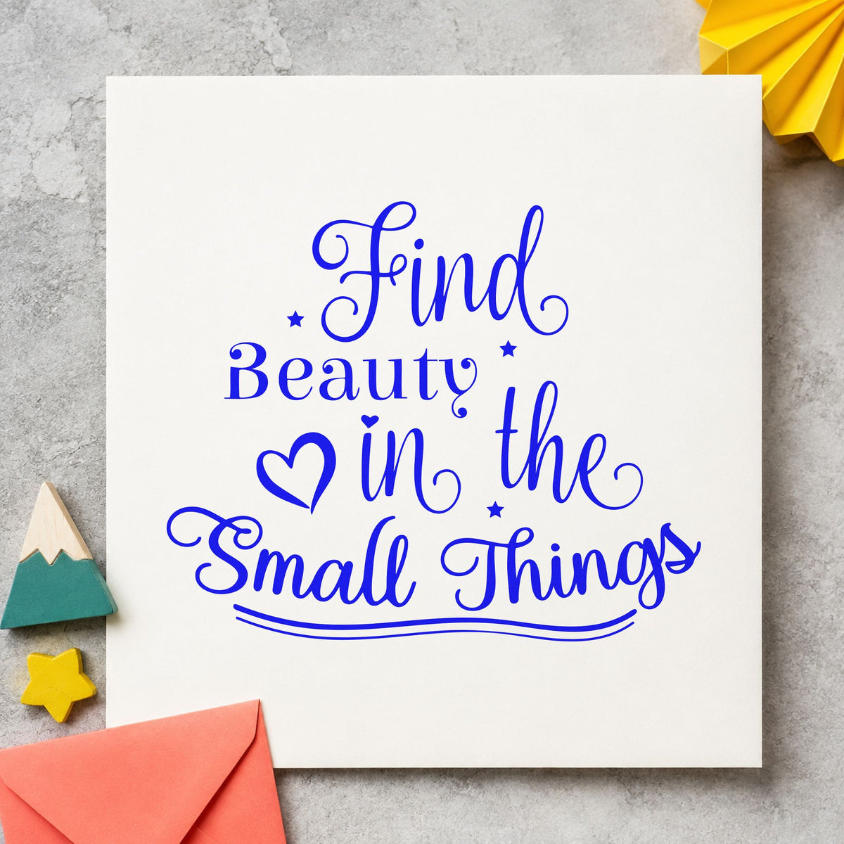 Find Beauty In Small Things craft stamp imprinted in blue ink on paper, a design suited to framed window ledge.