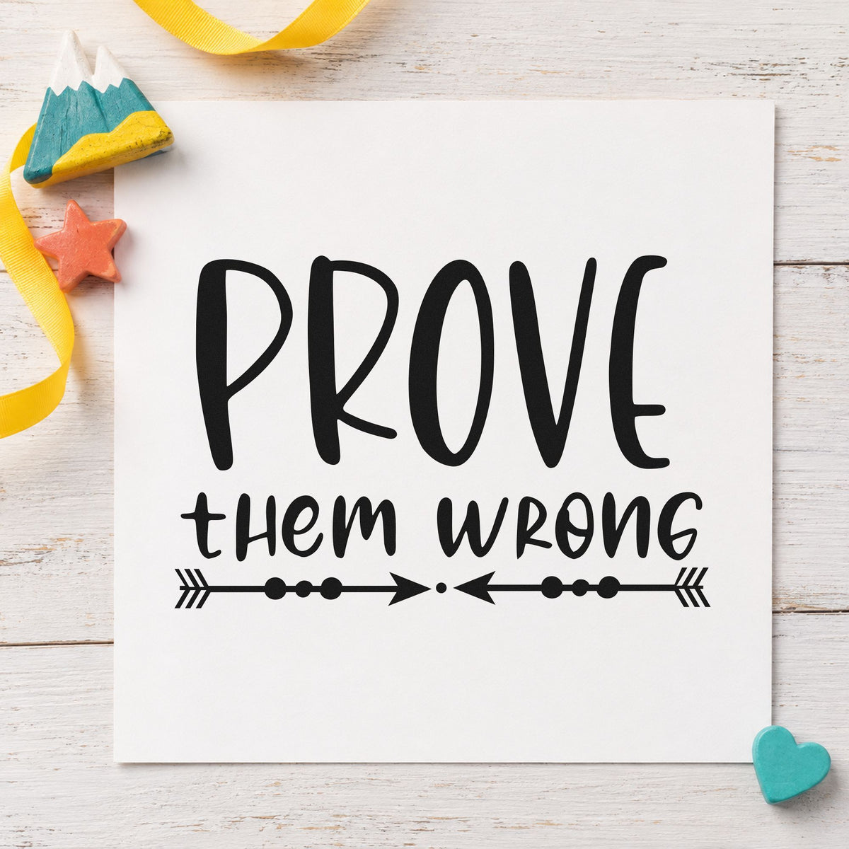 Prove Them Wrong Arrows craft stamp imprint in black ink on a handmade project, one idea being warmup kit gift tags.
