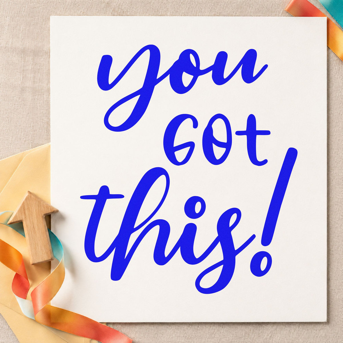 You Got This Script craft stamp imprinted in blue ink on paper, a design suited to framed study corner.