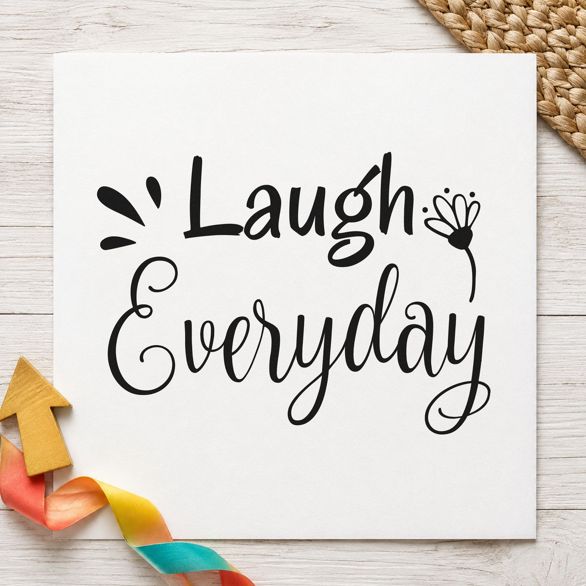 Laugh Every Day Flower craft stamp in black ink on cardstock, an easy option for family album page.