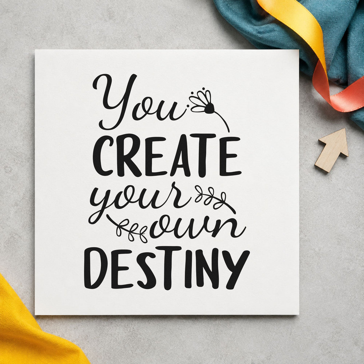 Create Your Own Destiny craft stamp imprint in black ink on a handmade project, one idea being party favor tags.
