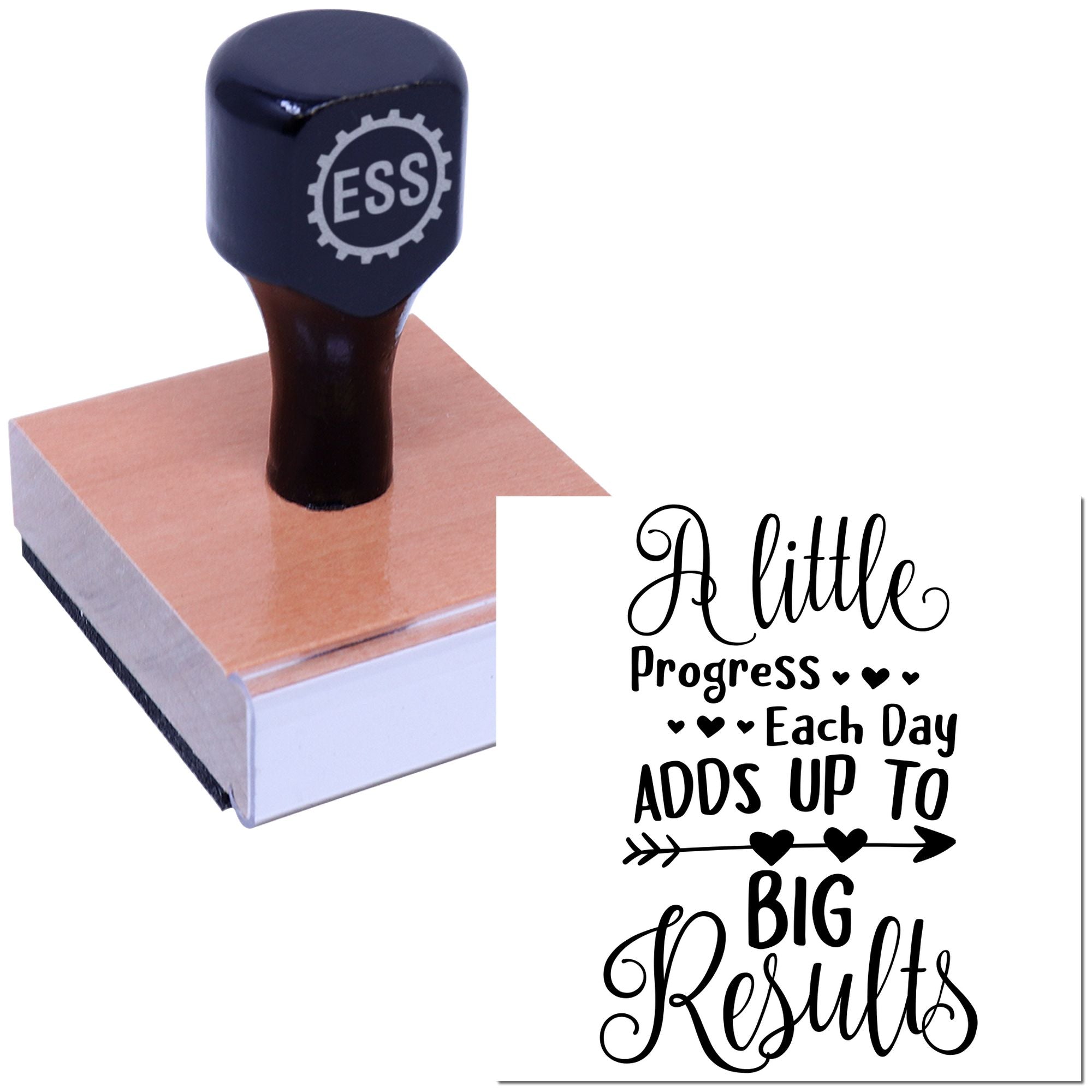 Dark navy custom rubber stamp and seal on wooden block, with ESS logo and A little progress each day adds up to big results text.