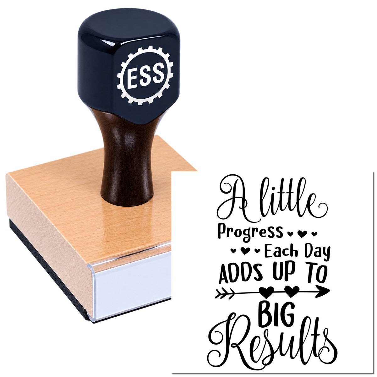 Dark navy custom rubber stamp and seal on wooden block, with ESS logo and "A little progress each day adds up to big results" text.