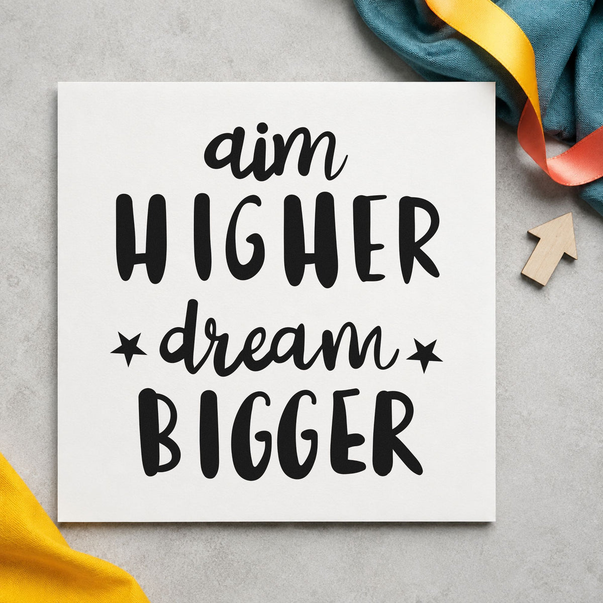 Aim Higher Dream Bigger rubber stamp printed in black ink, ready for flight log sheet and similar paper crafts.