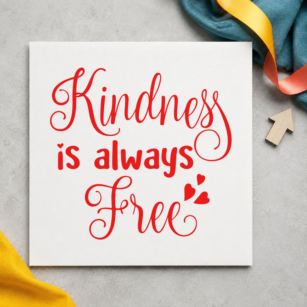 Kindness Is Always Free craft stamp imprint in red ink on a handmade project, one idea being need list cards.