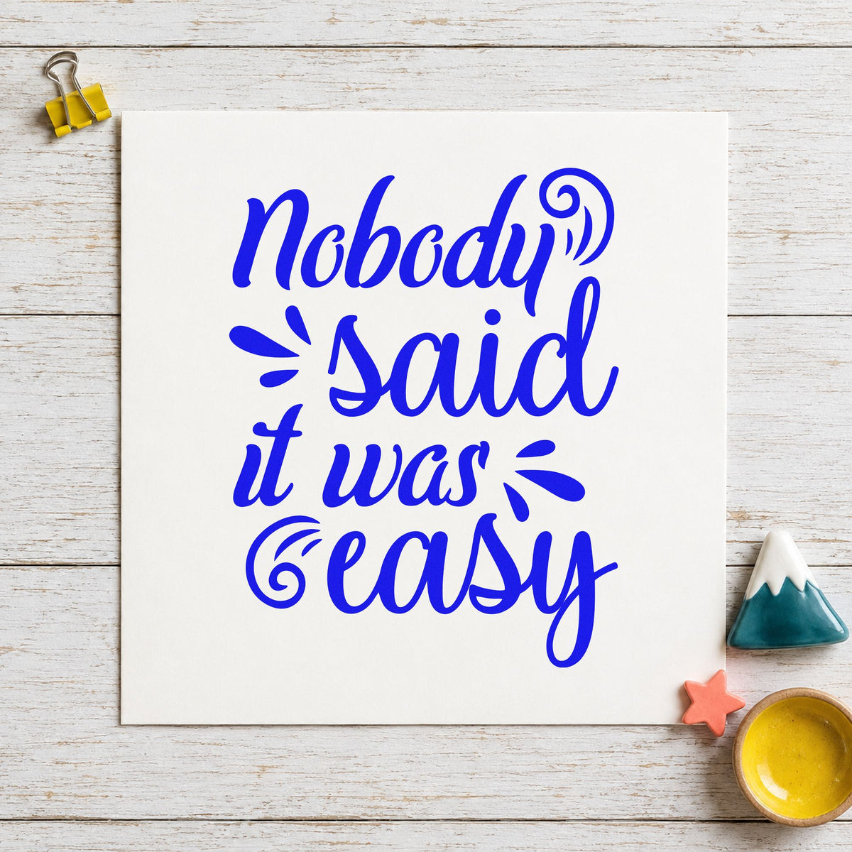 Nobody Said It Was Easy craft stamp in blue ink on cardstock, an easy option for crash pad printing.