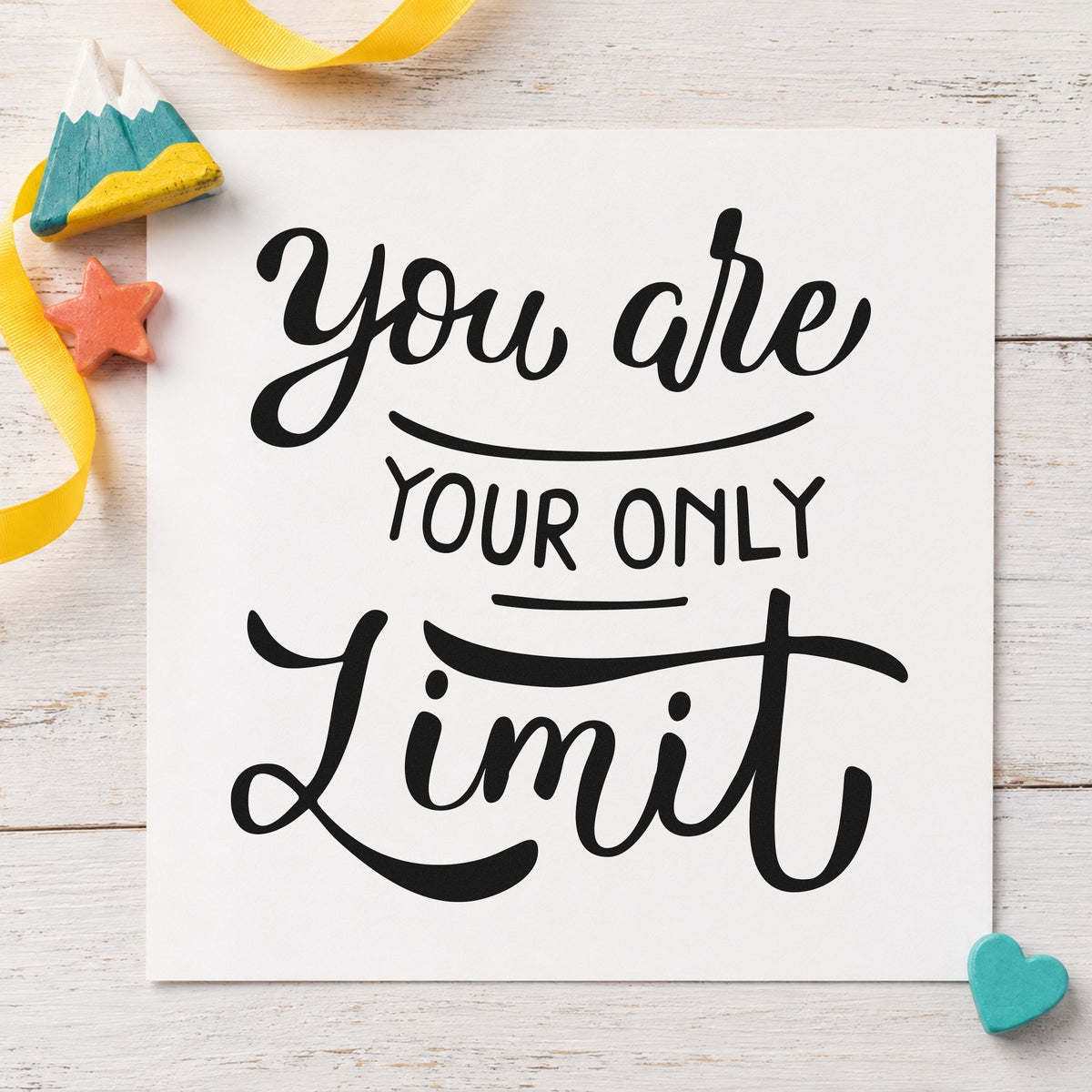 You Are Your Only Limit craft stamp imprint in black ink on a handmade project, one idea being belt gift tags.