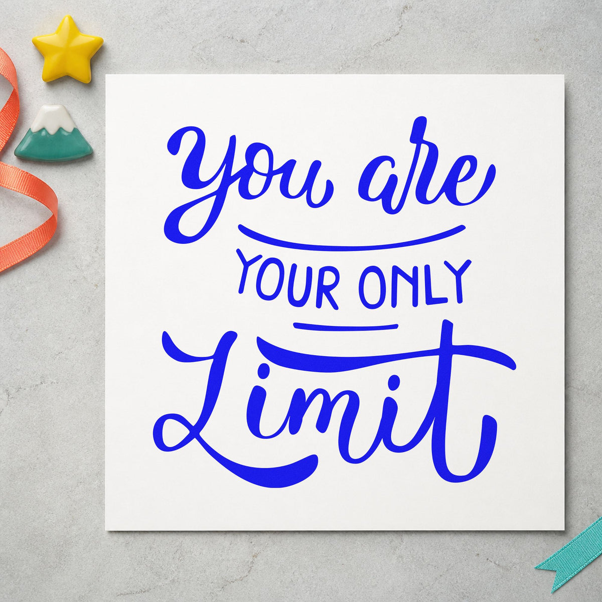 You Are Your Only Limit craft stamp in blue ink on cardstock, an easy option for gym towel printing.