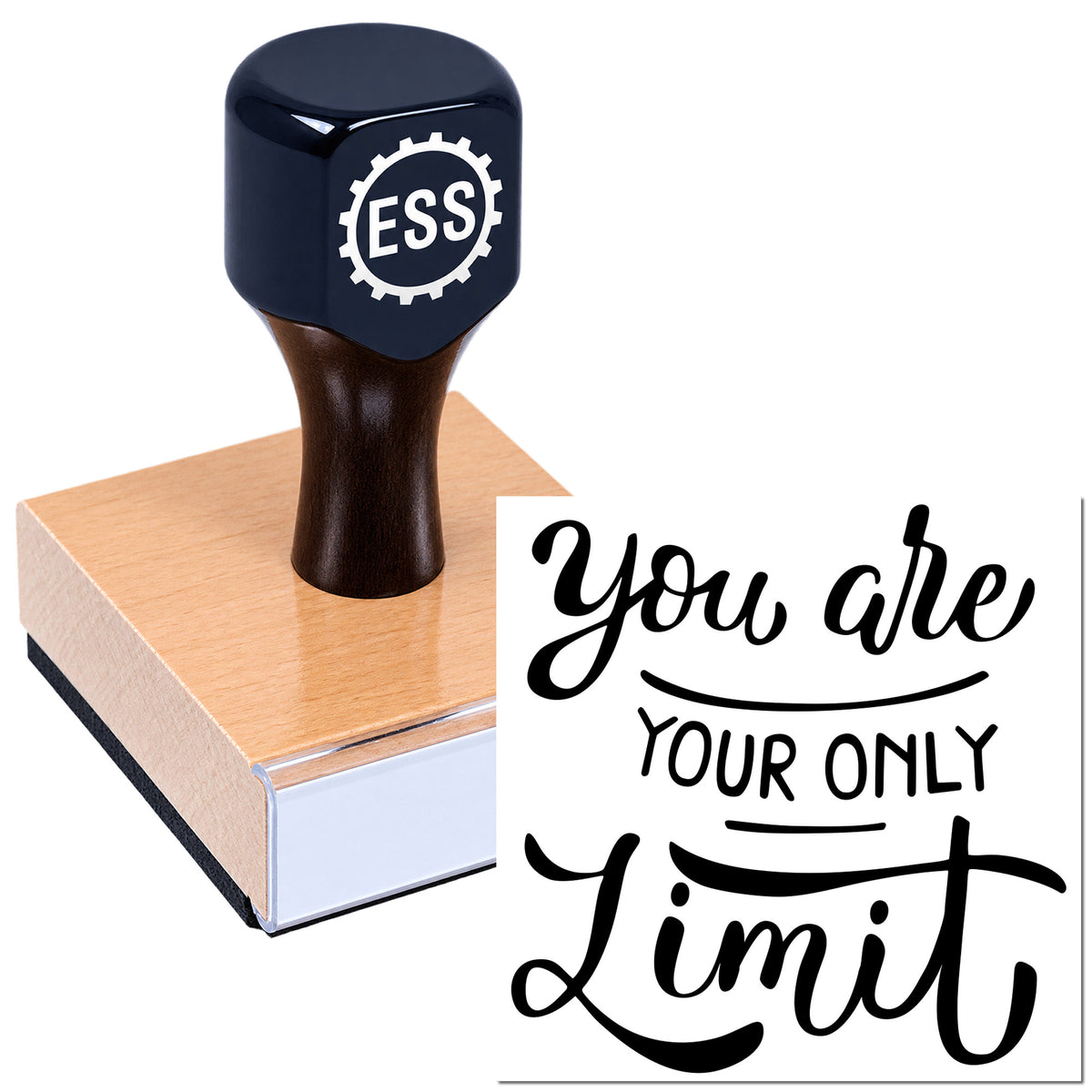Black ESS rubber stamp on pink wooden block, with "You are your only limit" seal imprint