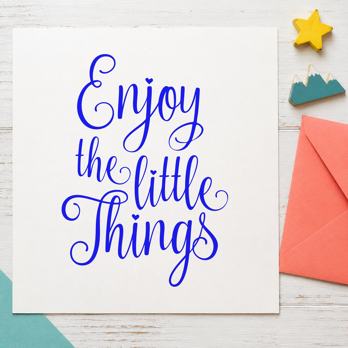 Enjoy The Little Things craft stamp in blue ink on cardstock, an easy option for tea towel printing.