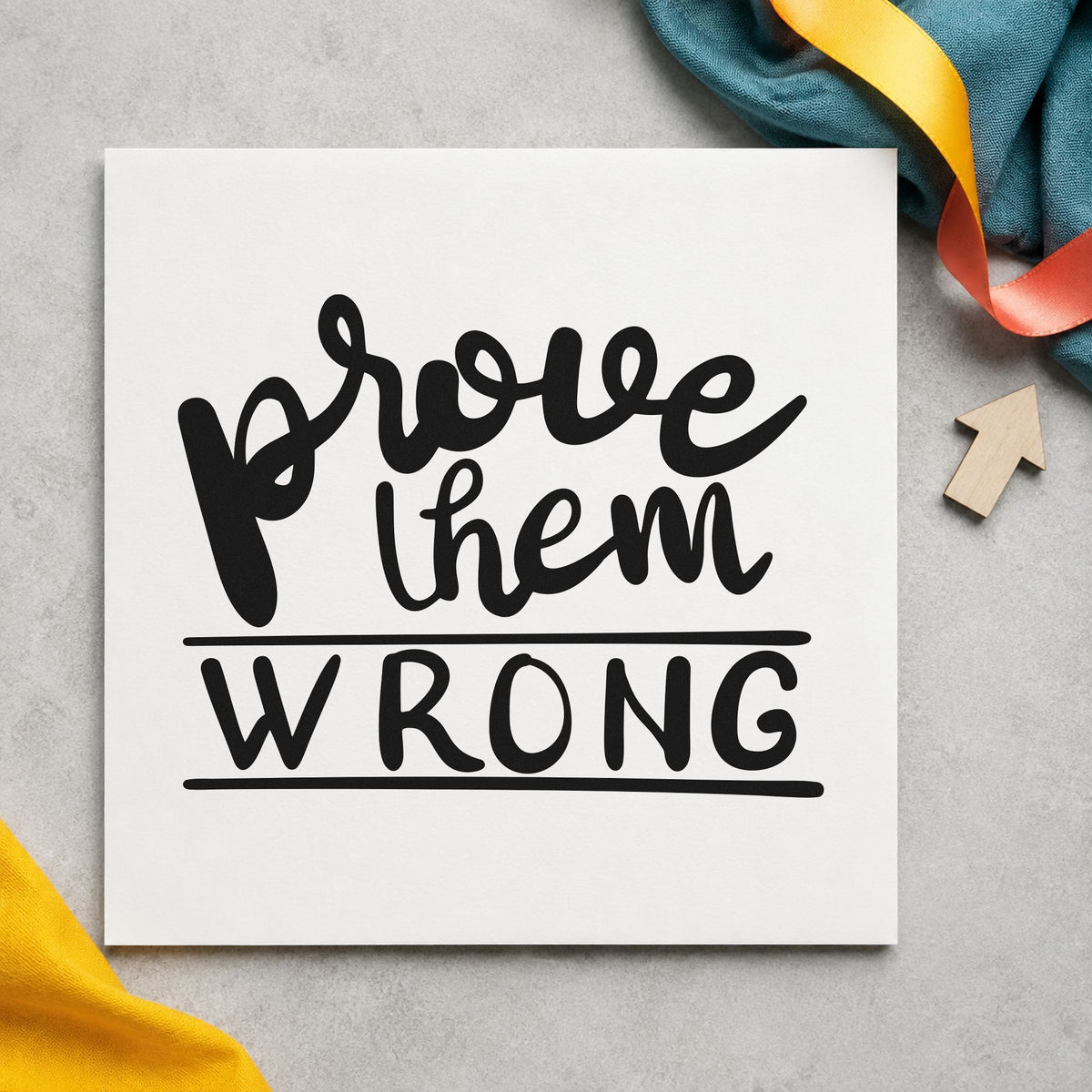 Prove Them Wrong Bold craft stamp imprint in black ink on a handmade project, one idea being sample kit gift tags.