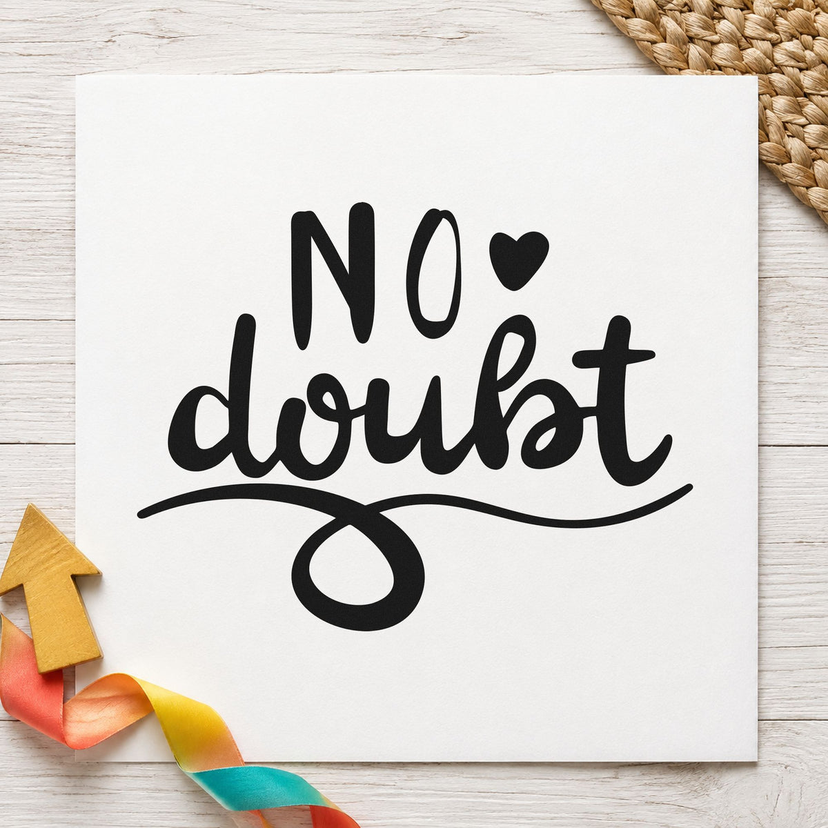 No Doubt Heart Flourish craft stamp imprint in black ink on a handmade project, one idea being quiver gift tags.