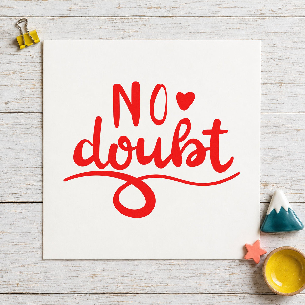 No Doubt Heart Flourish craft stamp imprint in red ink on a handmade project, one idea being round tally cards.